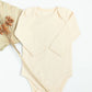 Baby organic cotton ribbed bodysuit: Beige