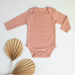 Baby organic cotton ribbed bodysuit: Clay